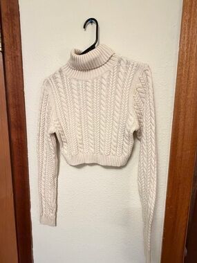 La Hearts Cropped Cable Turtleneck Sweater in Cream
